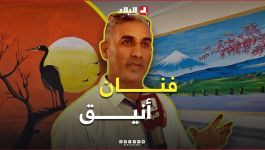 بربطة عنقه و #بدلته #الرسمية.. #عز_الدين يحوّل #الجدران إلى #لوحات_فنية
